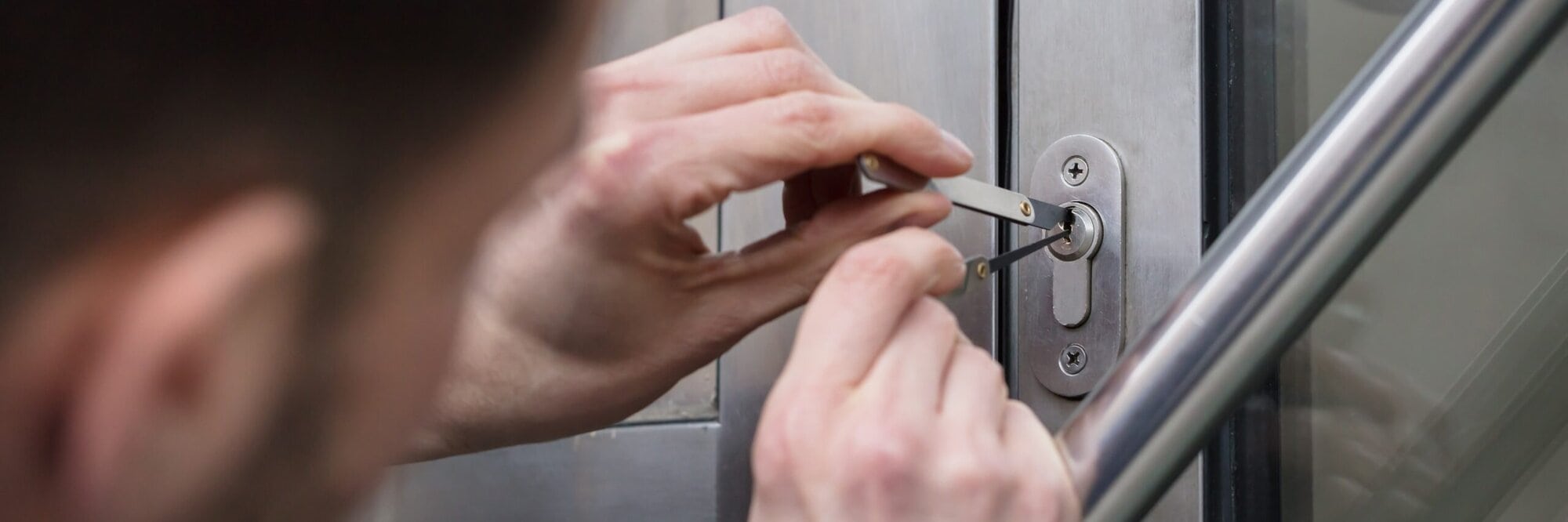 Top Security Tips | Protect Your Home and Business Today 24/7 Locksmiths A locksmith assisting a customer in an emergency situation, representing emergency locksmith services.