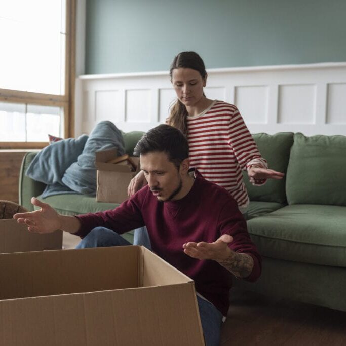 young-couple-moving-into-new-home